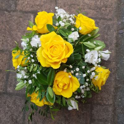 Peaceful Glow Posy - A delicate posy of yellow and white blooms, symbolising peace, remembrance, and gentle hope. Thoughtfully arranged to offer comfort and express heartfelt sympathy in a simple, elegant tribute.