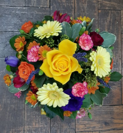 Vibrant Posy - Roses, Gerberas, Spray Roses, Spray Carnations, Lisianthus, Chrysanthemums and mixed foliage.