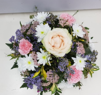 Kara Posie - Mixed pastel coloured flowers with a mixture of foliage.