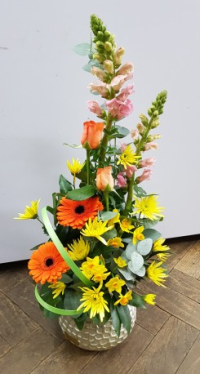 Summer Arrangement - Vibrant summer vase arrangement with Gerberas, Roses, Daffodils, Anthuriums, Chrysanthemums and mixed foliage.