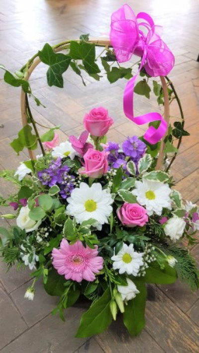 Pretty Basket - Pretty Basket with pastel colours. Pink Roses, White Chrysanths, Pink Gerbera with other florist choice lilac flowers.